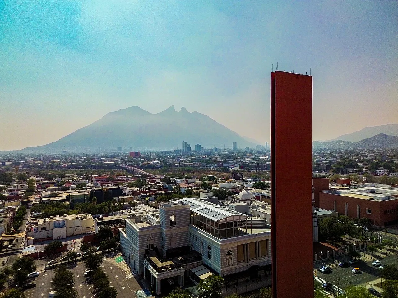 Aerial image of Cerro de La Silla and Faro del Comercio from the Macroplaza, Monterrey, Nuevo Leon, Mexico.